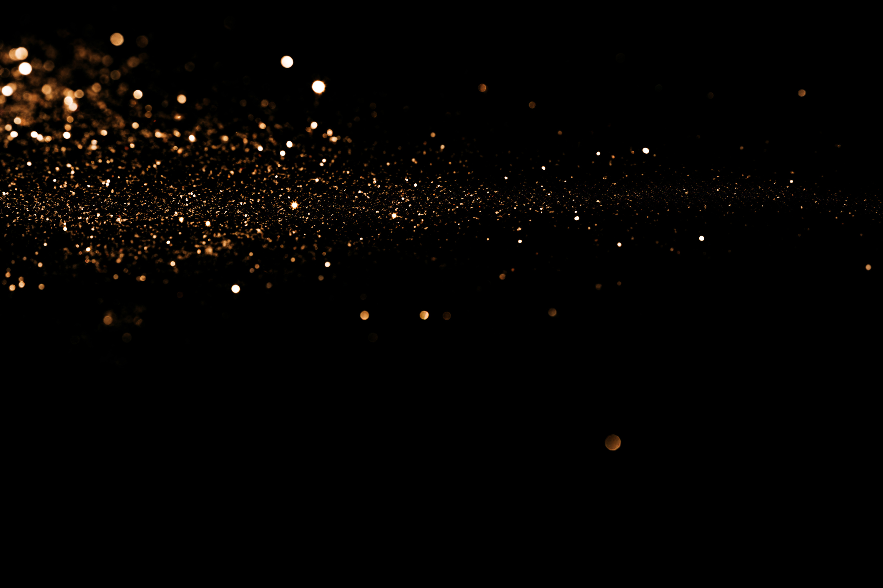 Scattered Sparkle Horizontally on Black Background Overlay Layer